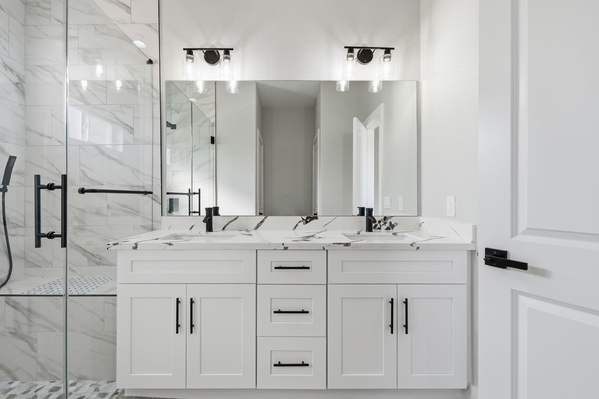 44 Meadow Lake Drive Trinity, TX 75862 - Photo 21 of 39 a bathroom with a double vanity sink mirror and double