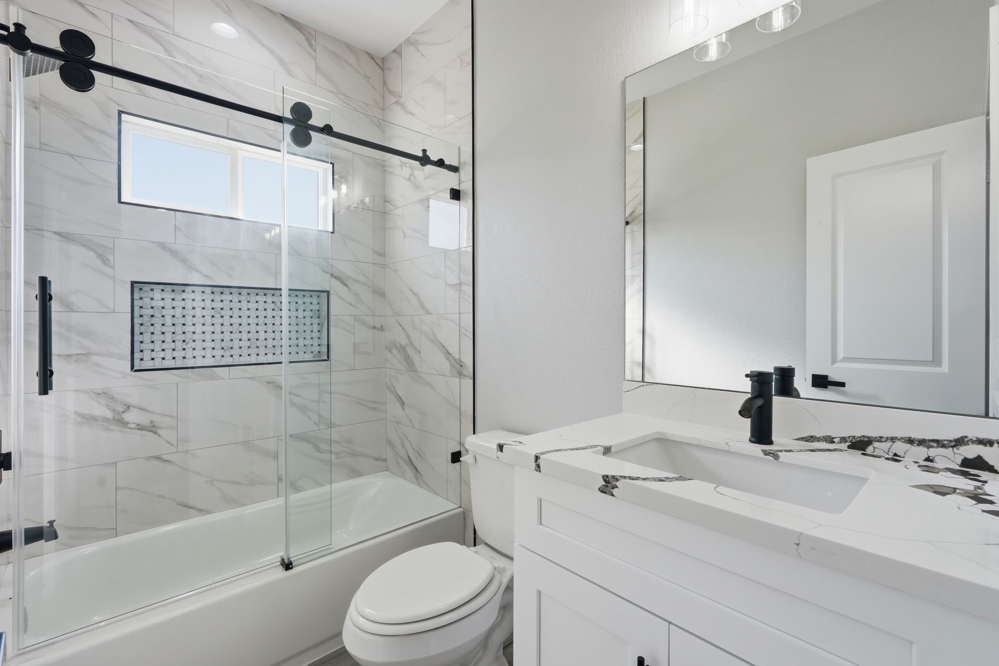 44 Meadow Lake Drive Trinity, TX 75862 - Photo 26 of 39 a bathroom with a sink a toilet and a bathtub