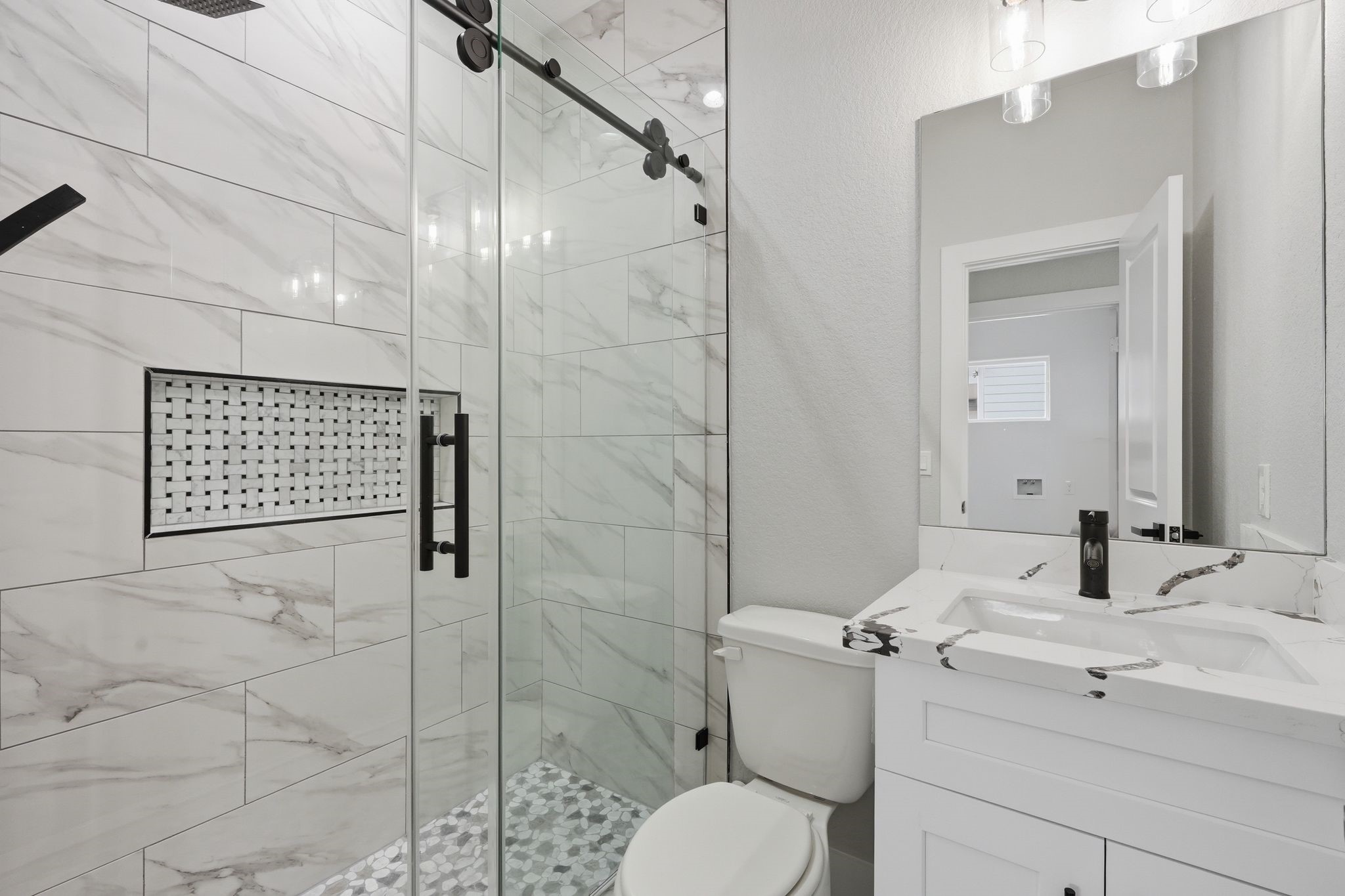 44 Meadow Lake Drive Trinity, TX 75862 - Photo 30 of 39 a bathroom with a sink toilet and shower