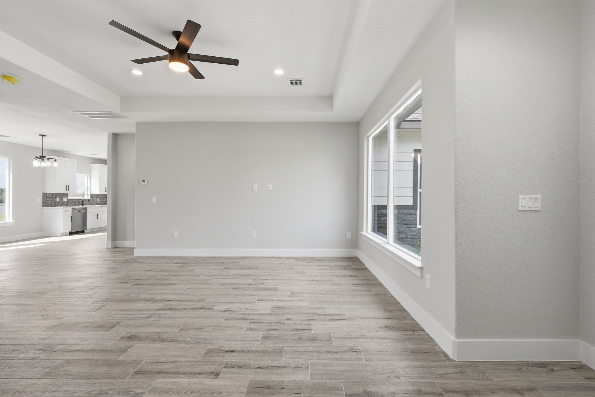 44 Meadow Lake Drive Trinity, TX 75862 - Photo 4 of 39 a view of empty room with wooden floor and a window