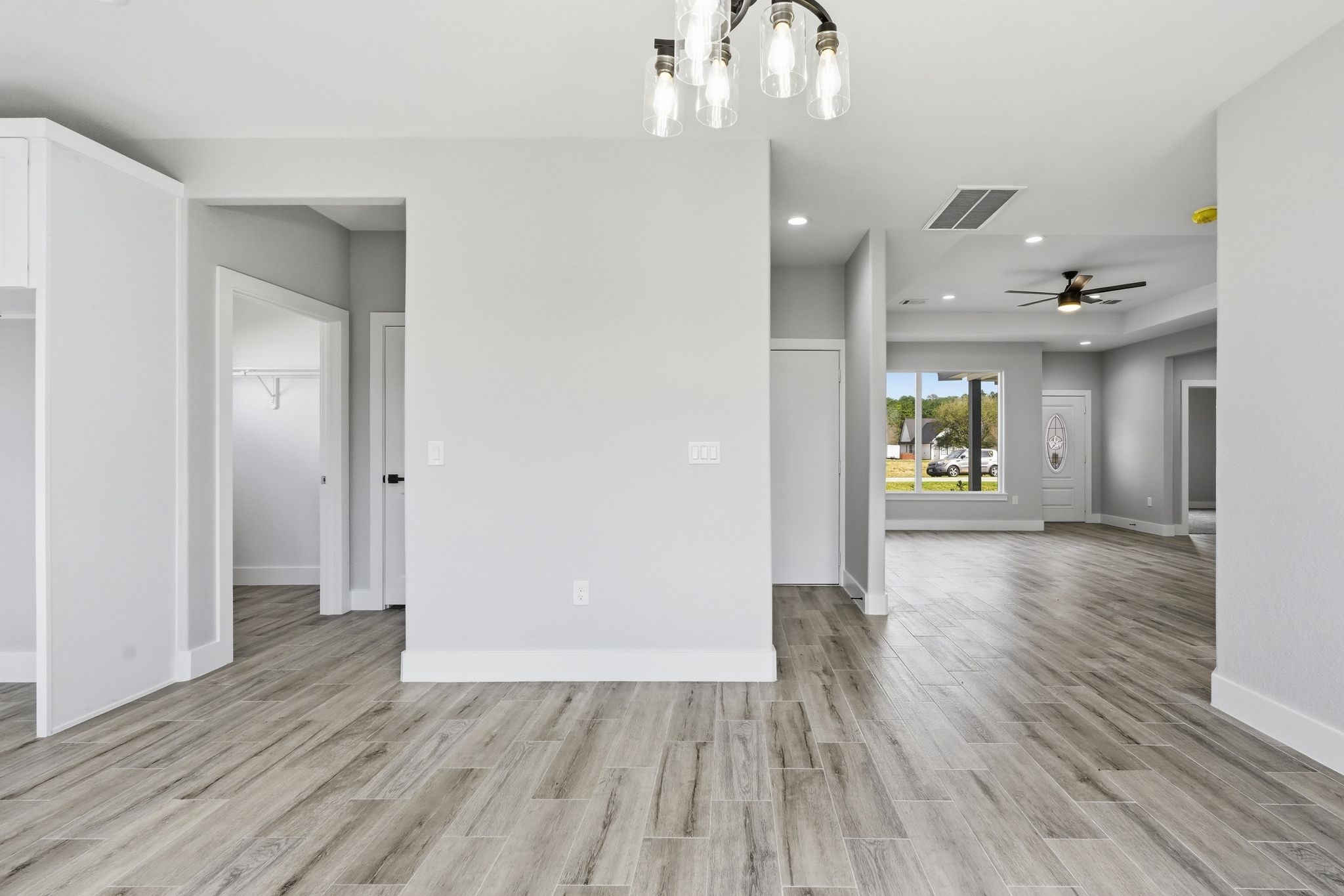 44 Meadow Lake Drive Trinity, TX 75862 - Photo 8 of 39 a view of an empty room and wooden floor