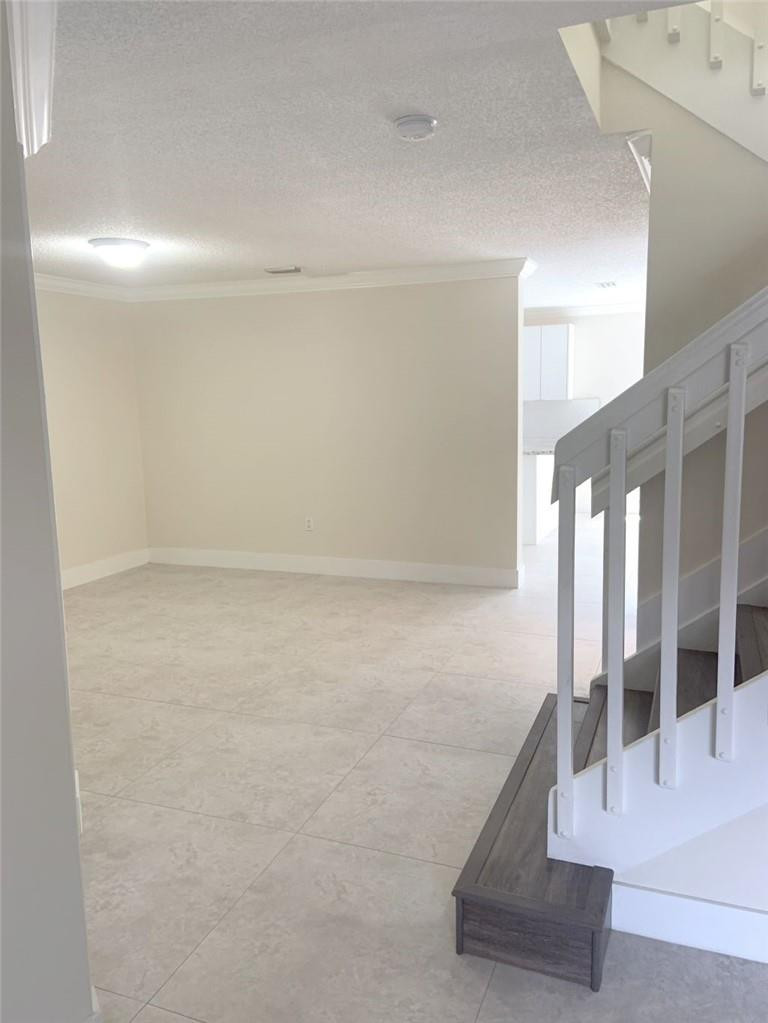 13402 Southwest 153rd Street, Unit 1901 Miami, FL 33177 - Photo 4 of 17 a view of a room with floor to ceiling windows