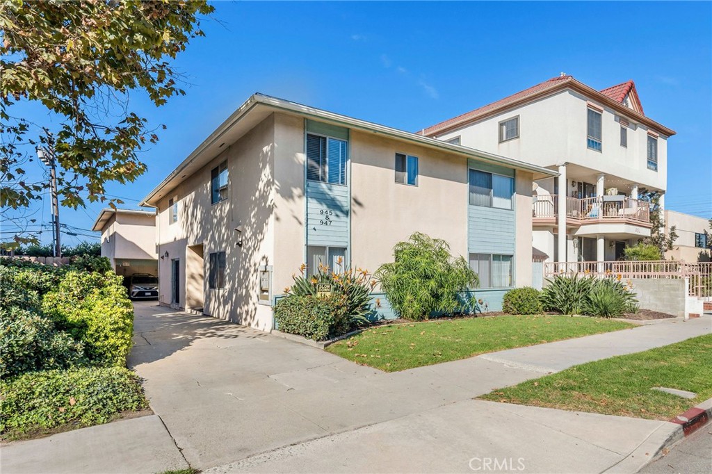945 Main Street El Segundo, CA 90245 - Photo 1 of 1 a front view of a house with a yard