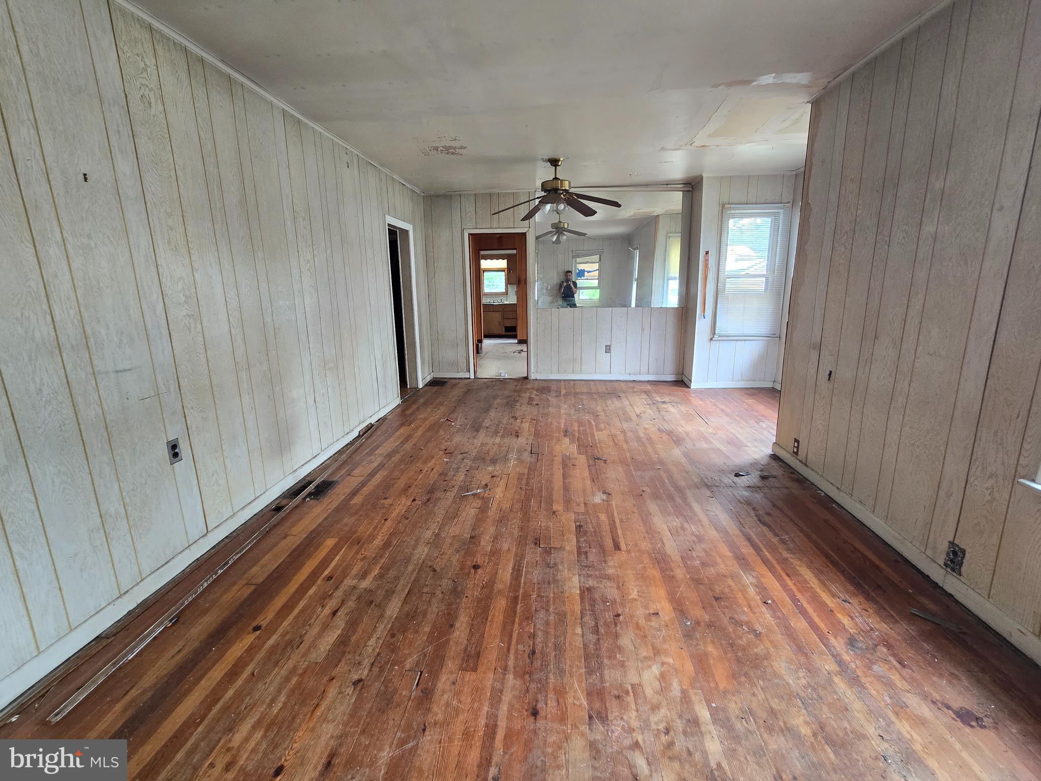 36 Atlantic Avenue Clementon, NJ 08021 - Photo 12 of 19 a view of a room with wooden floor staircase and windows