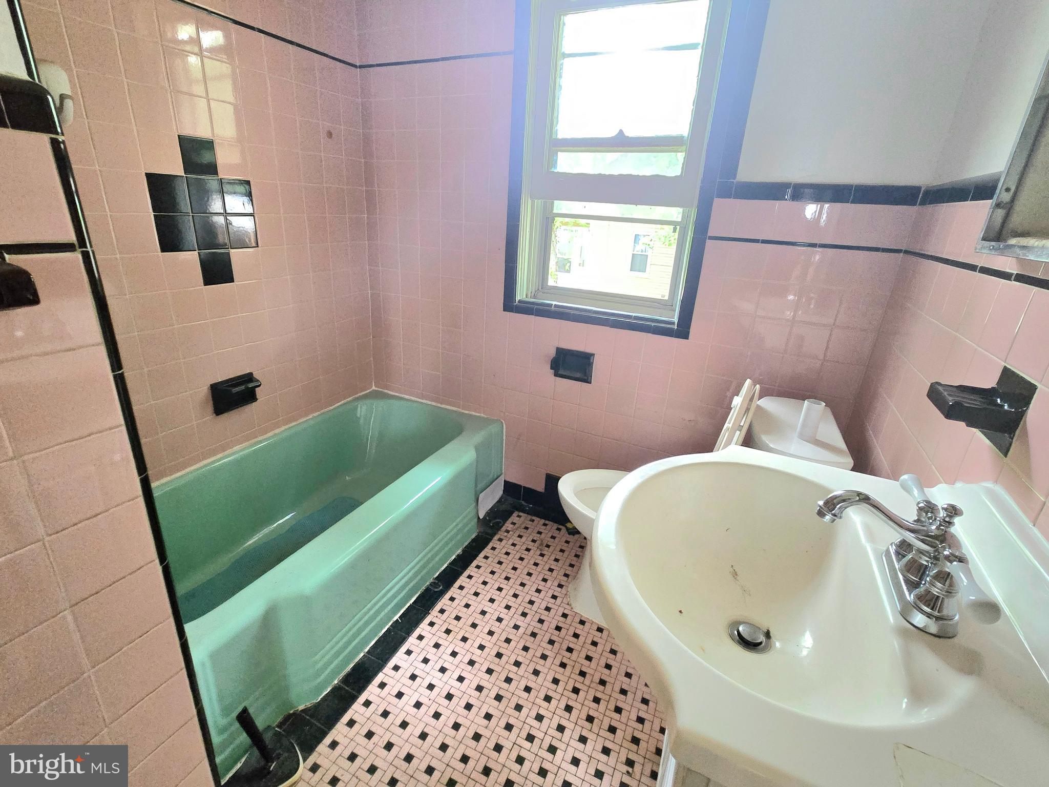 36 Atlantic Avenue Clementon, NJ 08021 - Photo 13 of 19 a bathroom with a sink and a mirror