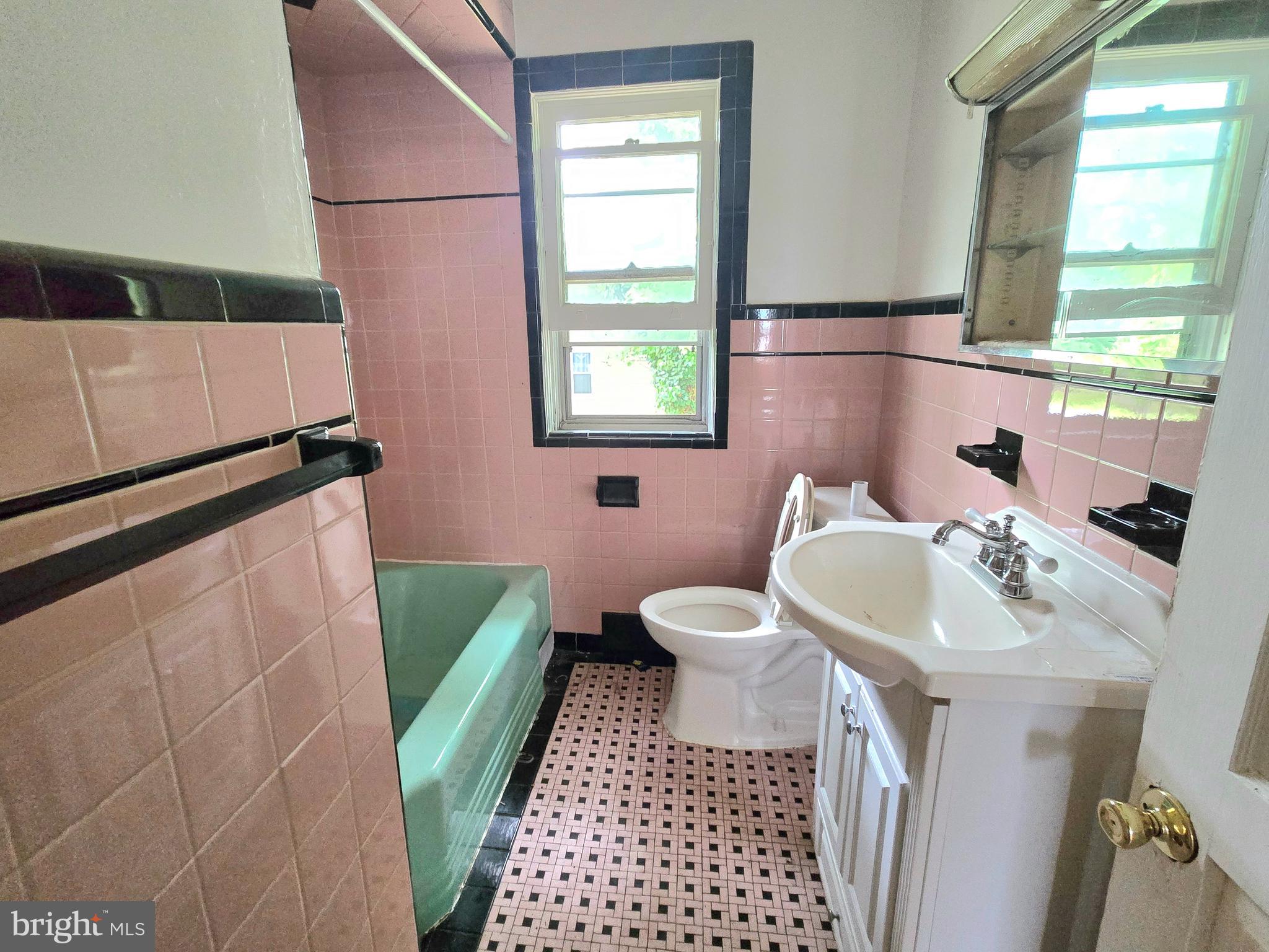 36 Atlantic Avenue Clementon, NJ 08021 - Photo 16 of 19 a bathroom with a sink and a toilet
