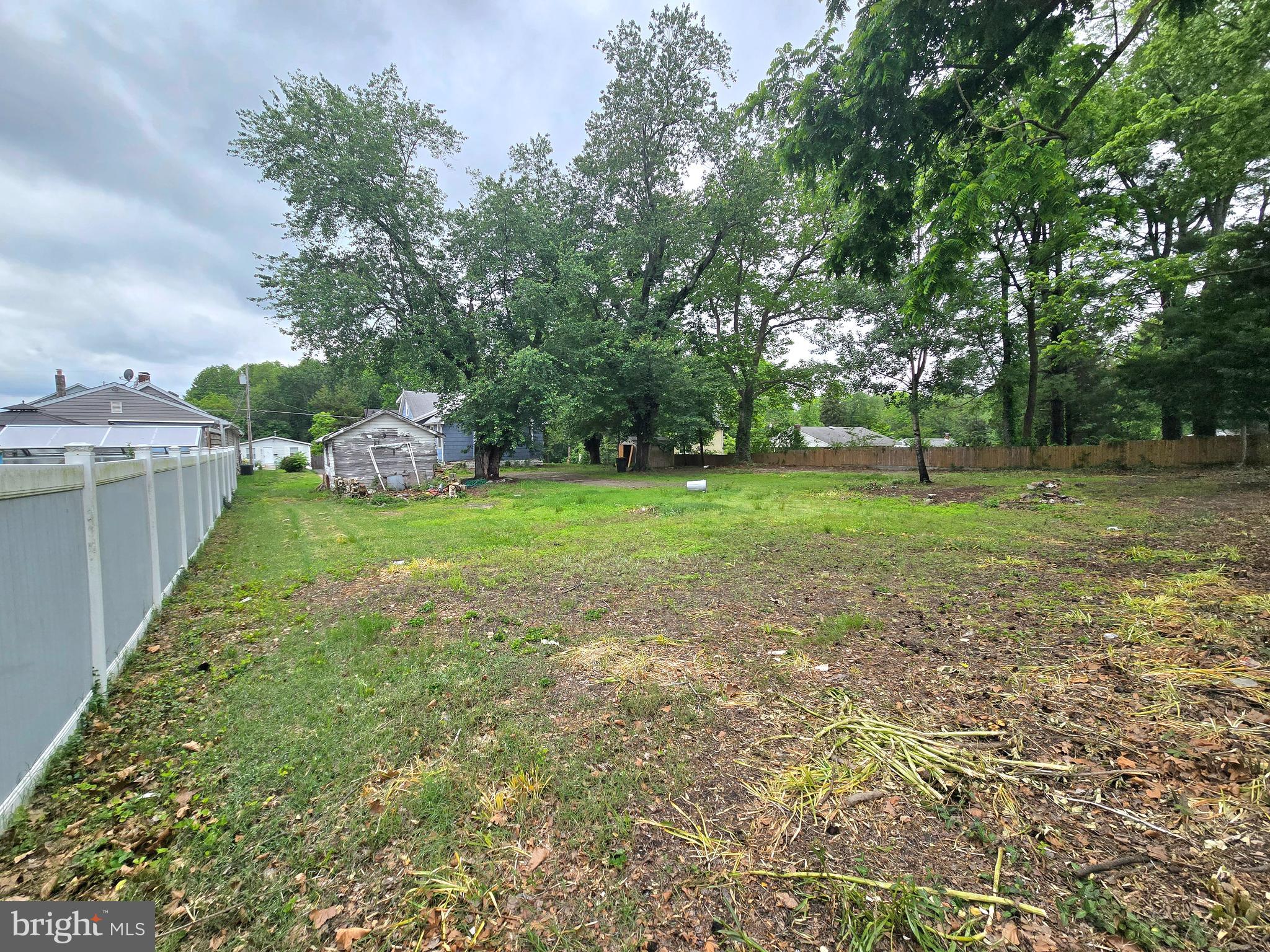 36 Atlantic Avenue Clementon, NJ 08021 - Photo 19 of 19 a view of a backyard with large trees