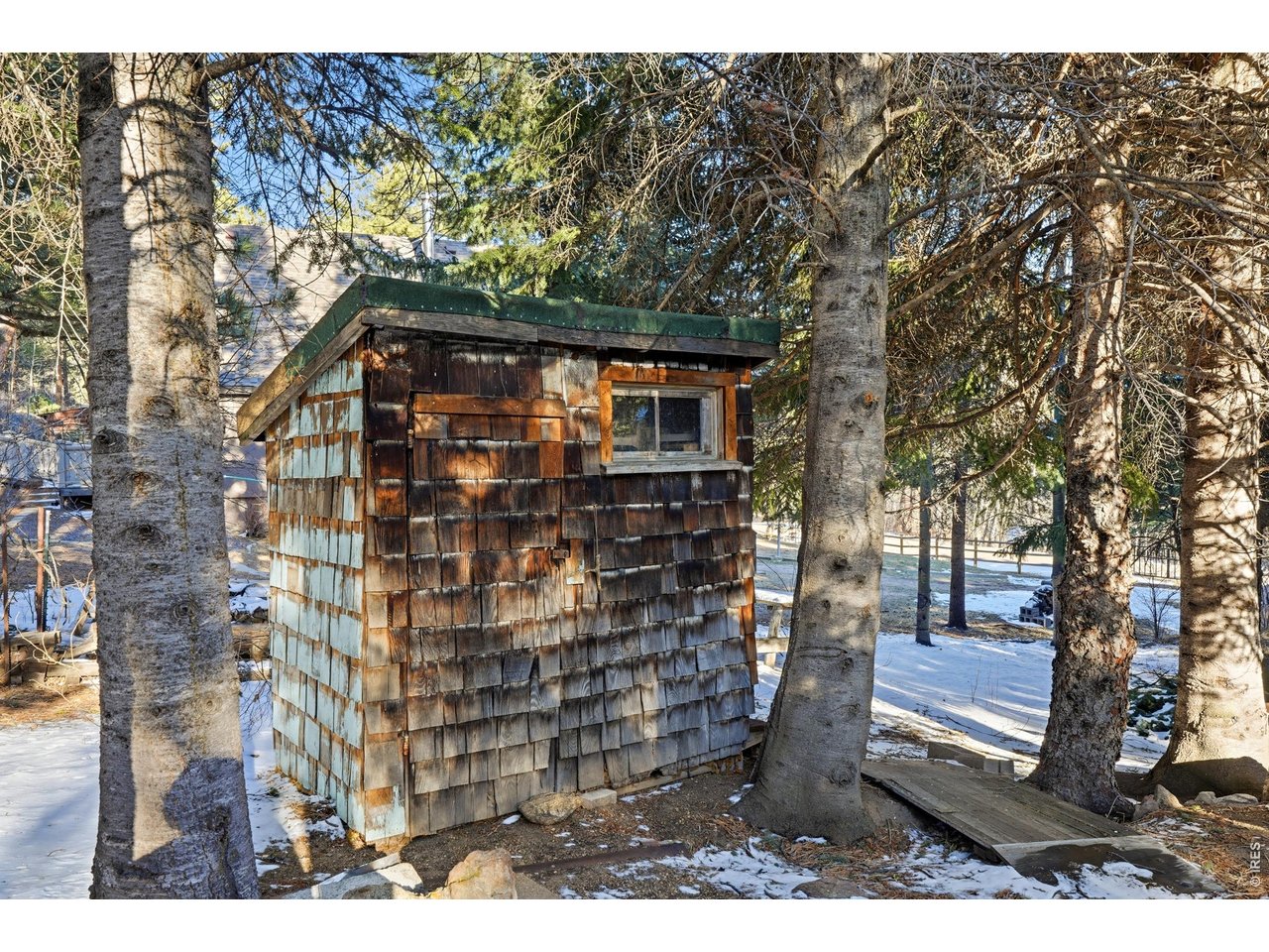 2476 Riverside Drive Lyons, CO 80540 - Photo 37 of 42 a front view of a house with a yard