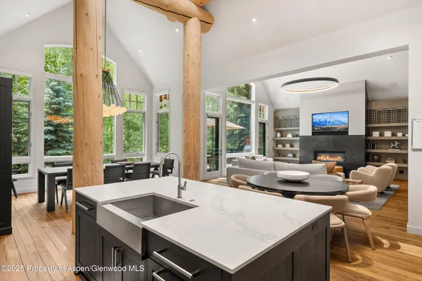 a view of a dining room with furniture window and outside view