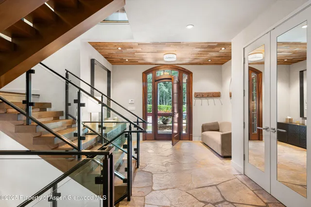 a view of entryway with livingroom and furniture