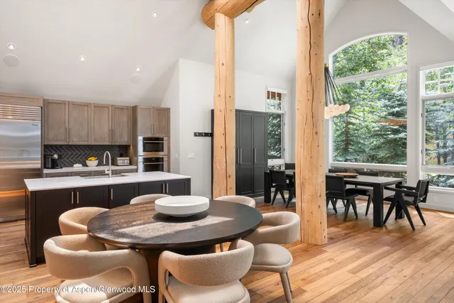 a table and chairs in a kitchen