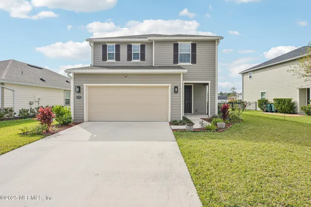 a front view of house with yard