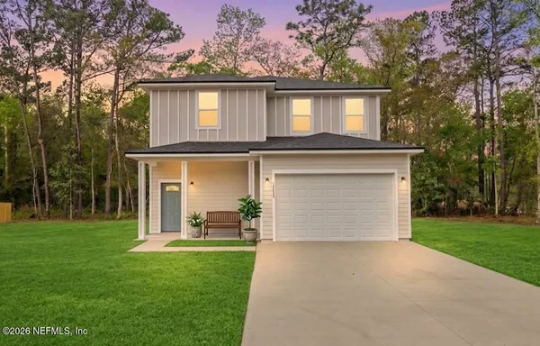 a front view of house with yard