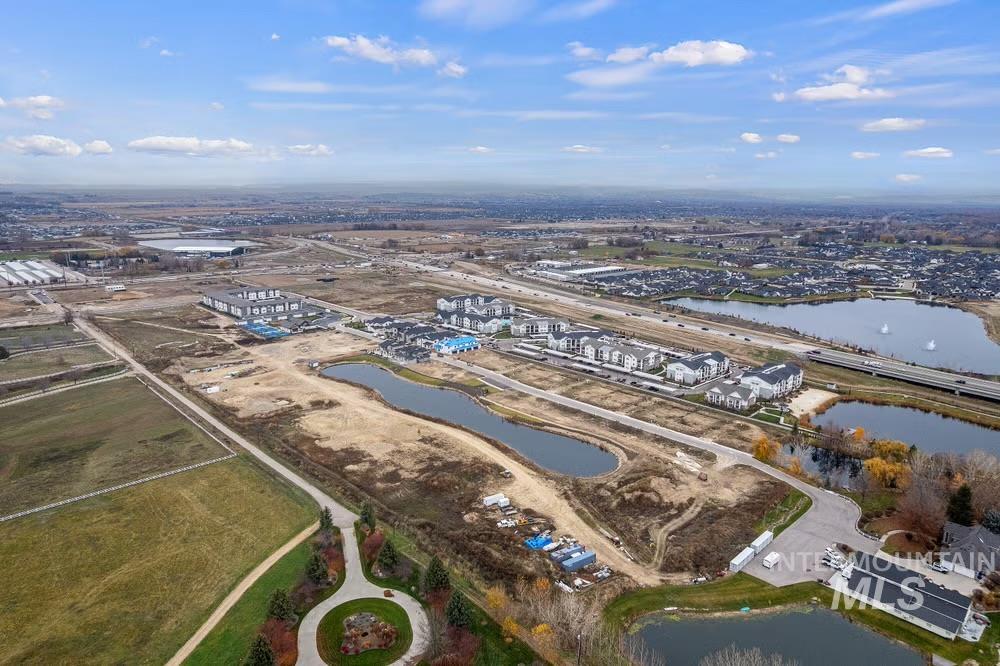 744 South Calhoun Lane Star, ID 83669 - Photo 2 of 18 Aerial view of property and surrounding area with a nearby body of water