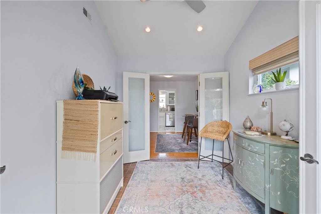 208 West Avenida De Los Lobos Marinos San Clemente, CA 92672 - Photo 11 of 33 a living room with furniture and a dresser