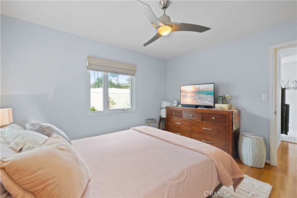 208 West Avenida De Los Lobos Marinos San Clemente, CA 92672 - Photo 19 of 33 a bedroom with a bed and a window