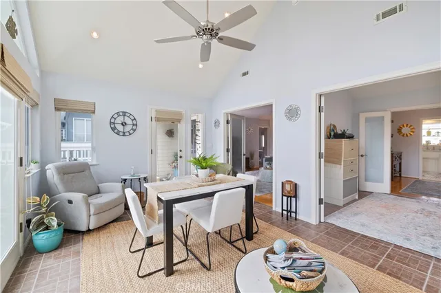 a view of a livingroom with furniture and a table
