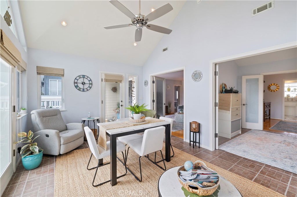 208 West Avenida De Los Lobos Marinos San Clemente, CA 92672 - Photo 5 of 33 a view of a livingroom with furniture and a table