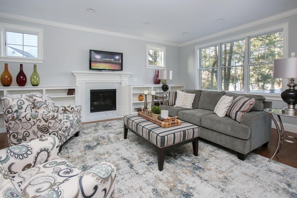 35 Hanson Road Newton, MA 02459 - Photo 3 of 11 a living room with furniture and a fireplace