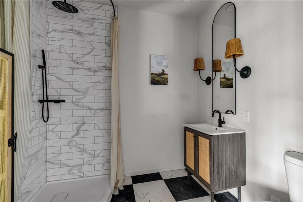 322 East Main Street Ligonier, PA 15658 - Photo 13 of 31 a bathroom with a sink and a mirror