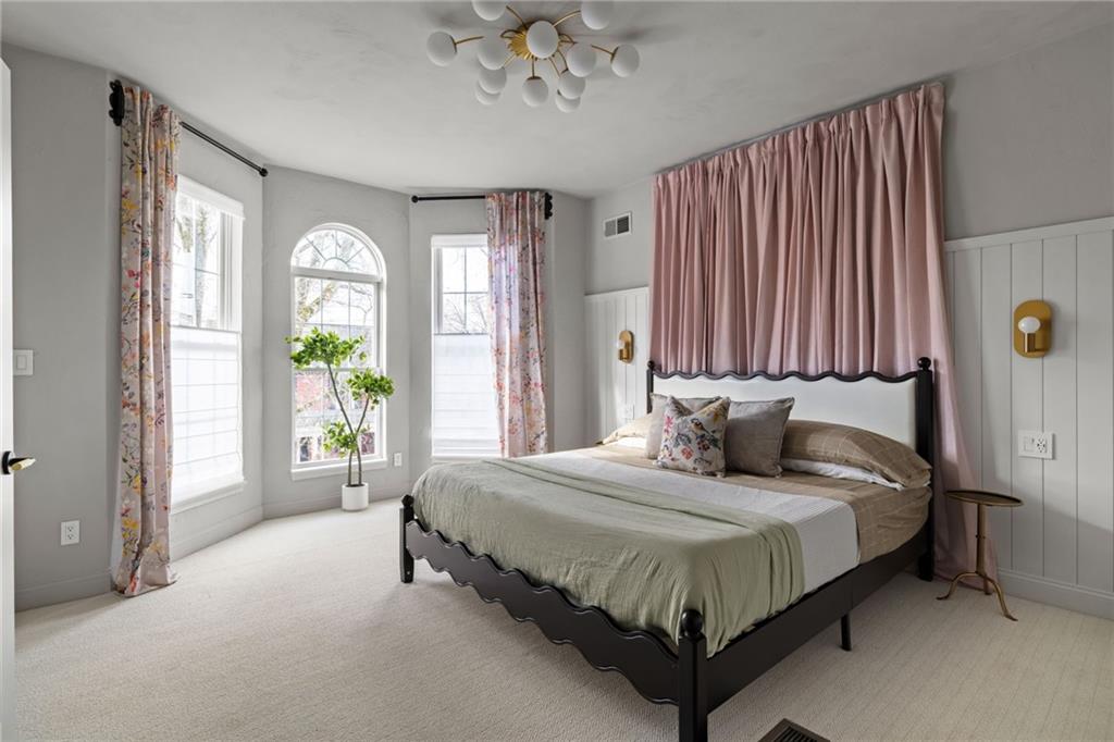 322 East Main Street Ligonier, PA 15658 - Photo 15 of 31 a bedroom with a bed lamp and window