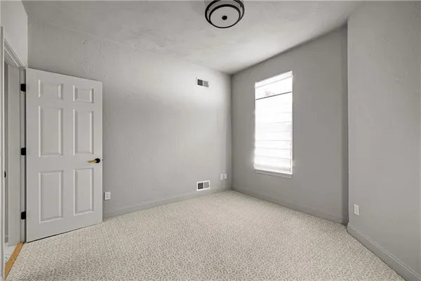 a view of empty room with window