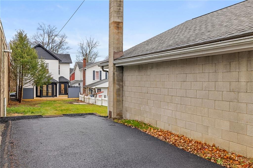 322 East Main Street Ligonier, PA 15658 - Photo 31 of 31 a view of a house with a yard and garage