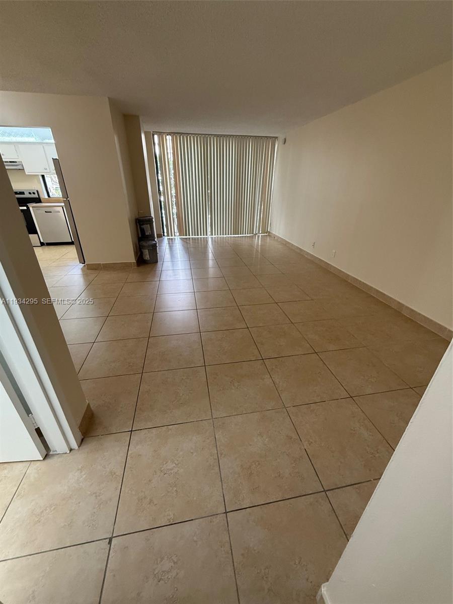 16919 North Bay Road, Unit 204 Sunny Isles Beach, FL 33160 - Photo 11 of 42 a view of an empty room with a window