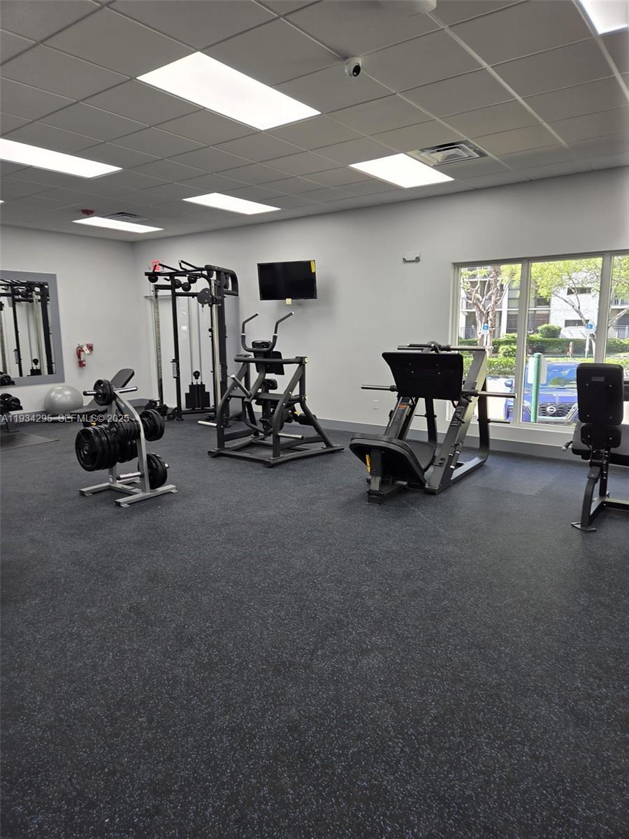 16919 North Bay Road, Unit 204 Sunny Isles Beach, FL 33160 - Photo 41 of 42 a view of a room with gym equipment