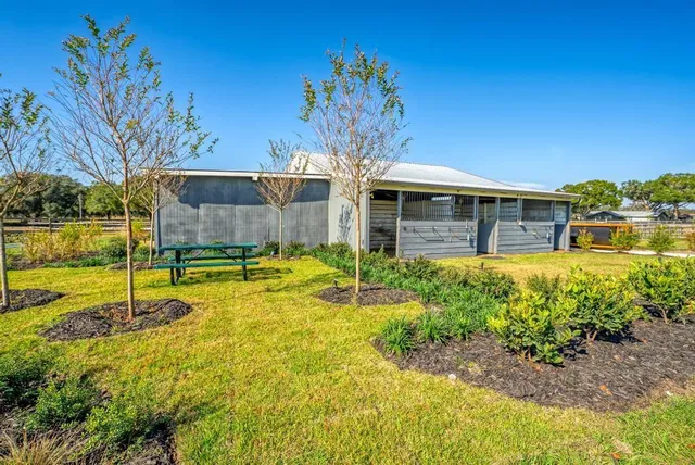 a view of a porch with a wooden floor