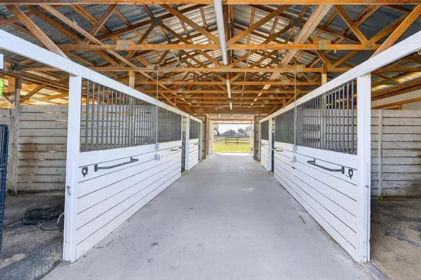 a view of a house with backyard from a patio