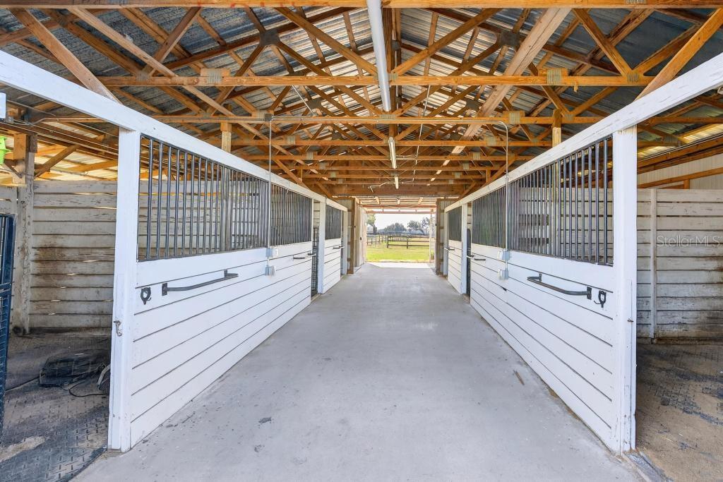 15305 Northwest 112th Place Road Morriston, FL 32668 - Photo 42 of 95 a view of a porch with a wooden floor