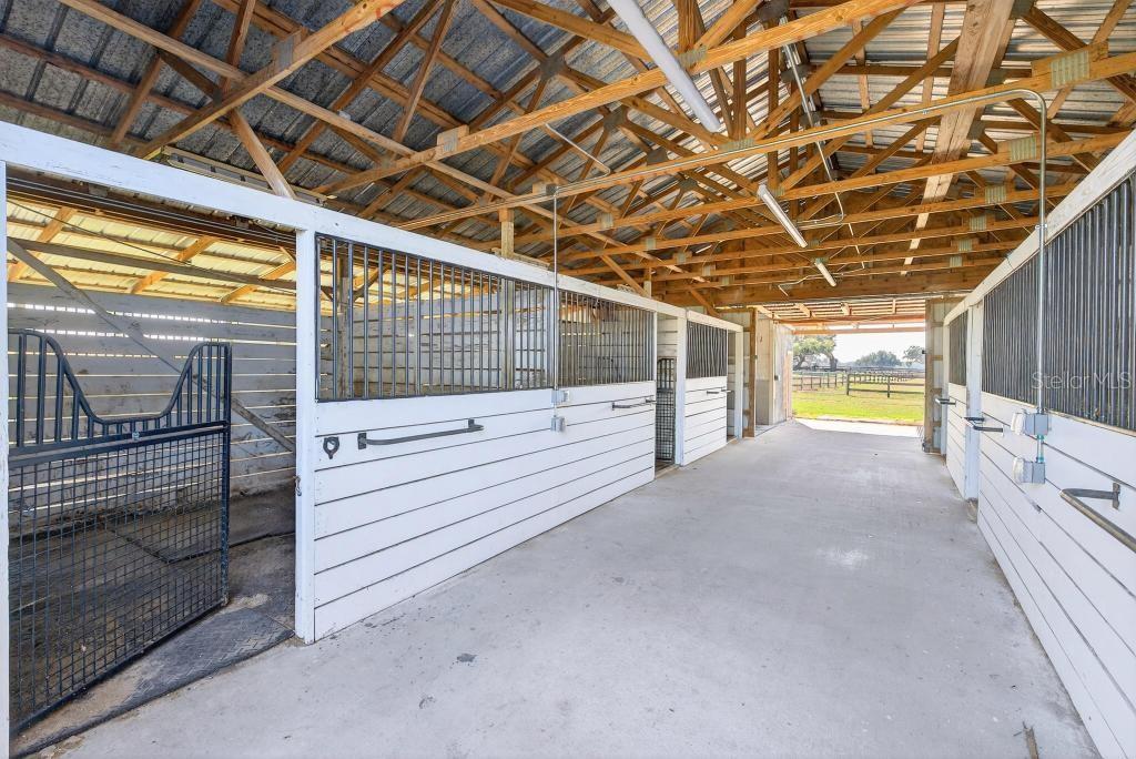 15305 Northwest 112th Place Road Morriston, FL 32668 - Photo 43 of 95 a view of a room with wooden floor