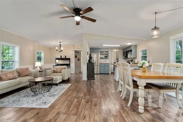 a view of a houses with swimming pool and lake view