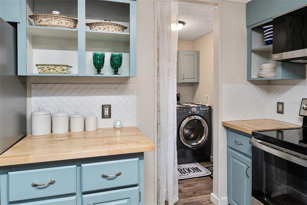 15305 Northwest 112th Place Road Morriston, FL 32668 - Photo 59 of 95 a kitchen with a stove and a sink