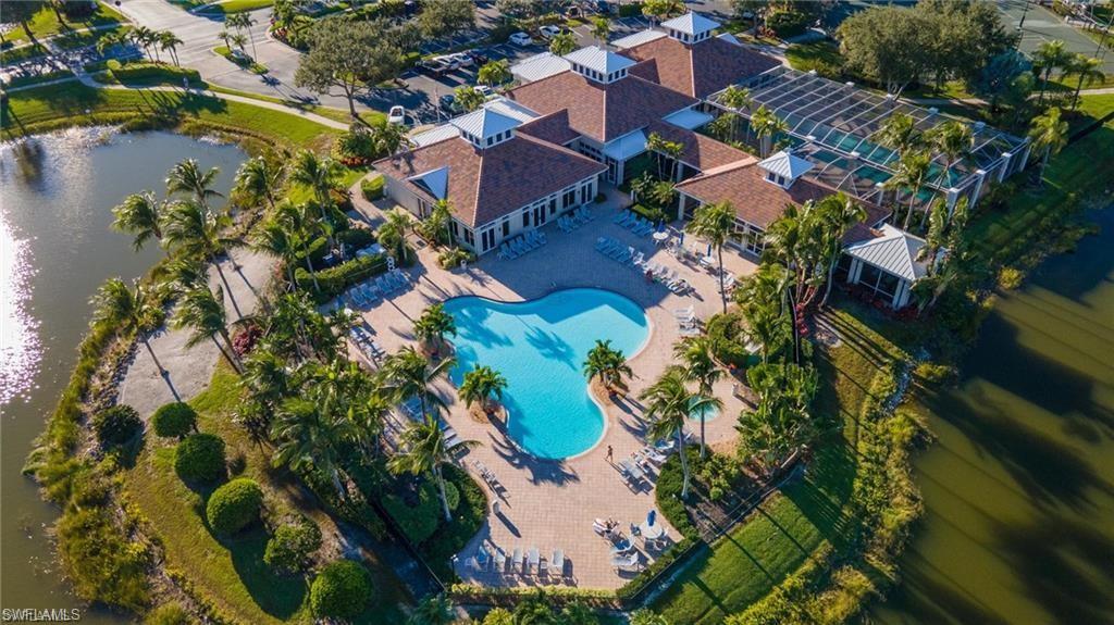 3200 Sundance Circle Naples, FL 34109 - Photo 5 of 6 an aerial view of residential houses with outdoor space