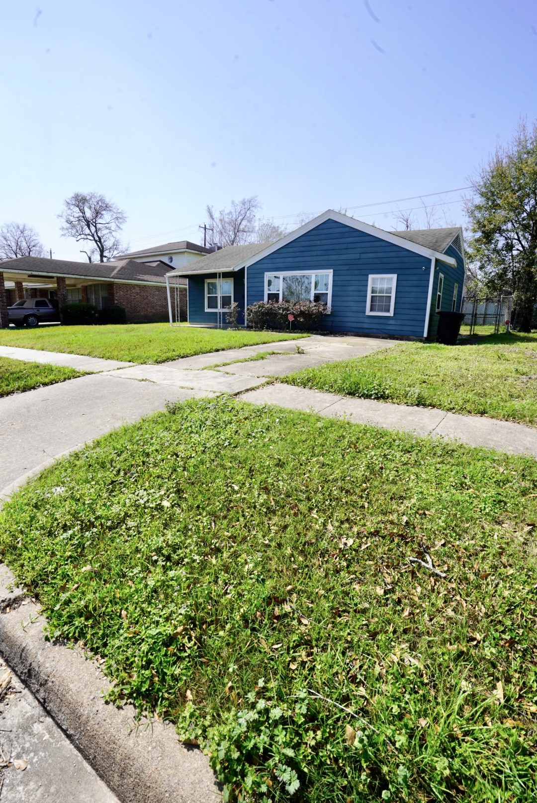 6814 Tierwester Street Houston, TX 77021 - Photo 2 of 13 a front view of a house with a yard