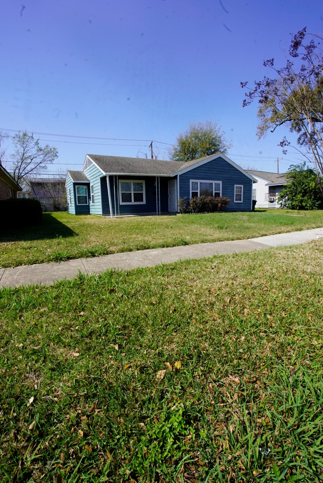 6814 Tierwester Street Houston, TX 77021 - Photo 3 of 13 a front view of a house with a garden
