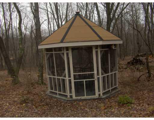 215 Dinnerbell Road Butler, PA 16002 - Photo 14 of 15 Land. Peaceful gazebo nestled among nature on this 4.81 acres of land.