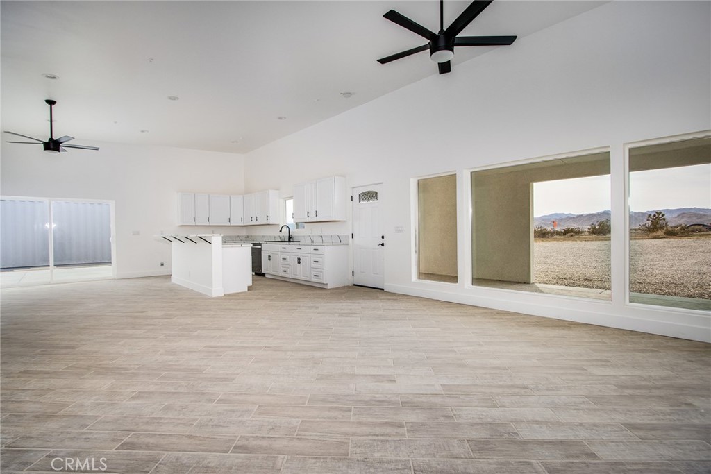 62474 Golden Street Joshua Tree, CA 92252 - Photo 10 of 31 a view of a kitchen with a sink and a window