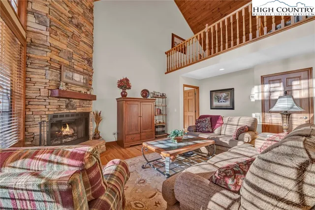 a bed room with a bed and a fireplace