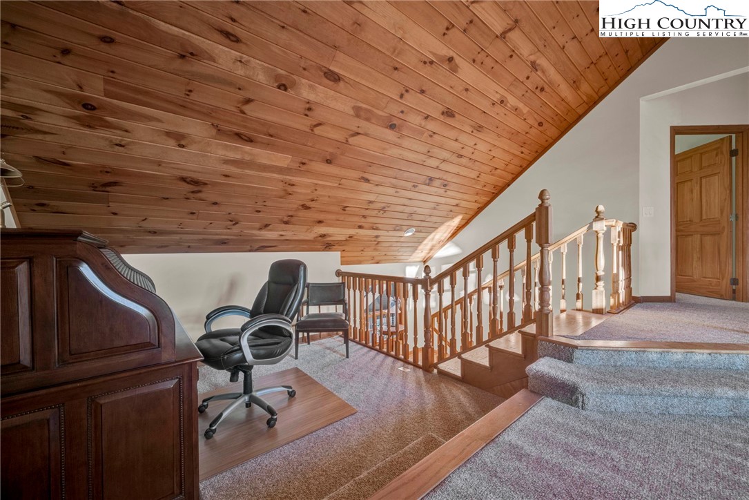 121 Spruce Hollow Road Beech Mountain, NC 28604 - Photo 29 of 50 a view of workspace with wooden floor and furniture