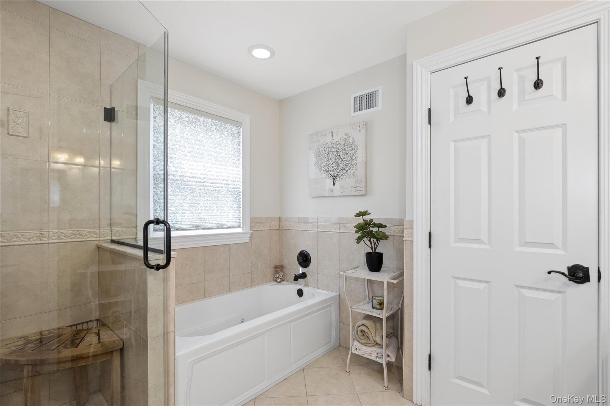 50 Belton Road Babylon, NY 11702 - Photo 23 of 34 There is a separate shower as well as a jacuzzi tub for the perfect spa experience..