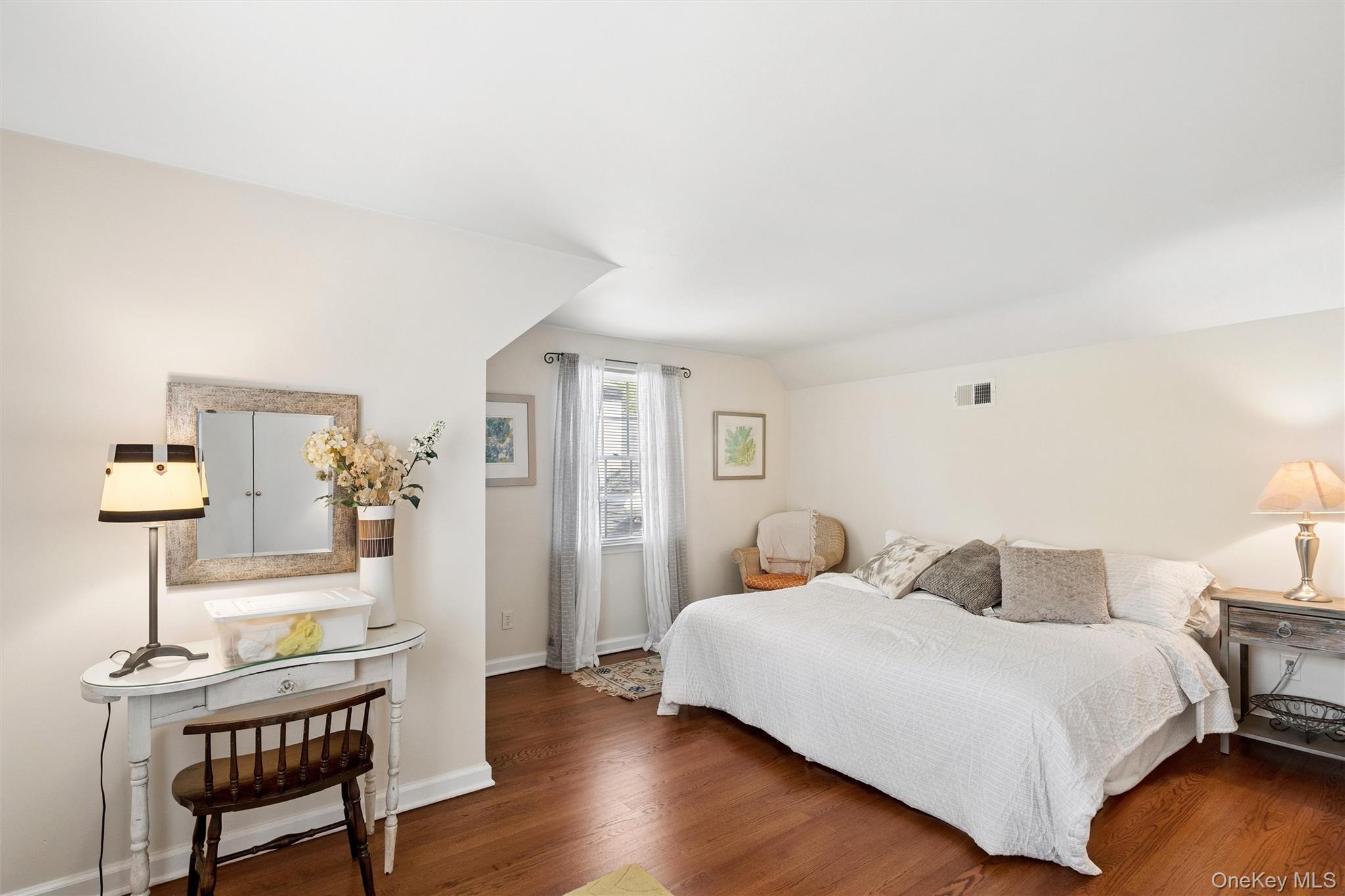 50 Belton Road Babylon, NY 11702 - Photo 24 of 34 A very spacious bedroom (17 ft 4" x 15 ft 6" ) with 3 windows for ample light and good cross ventilation for those perfect crisp days. There is also a a large closet and hardwood floors.