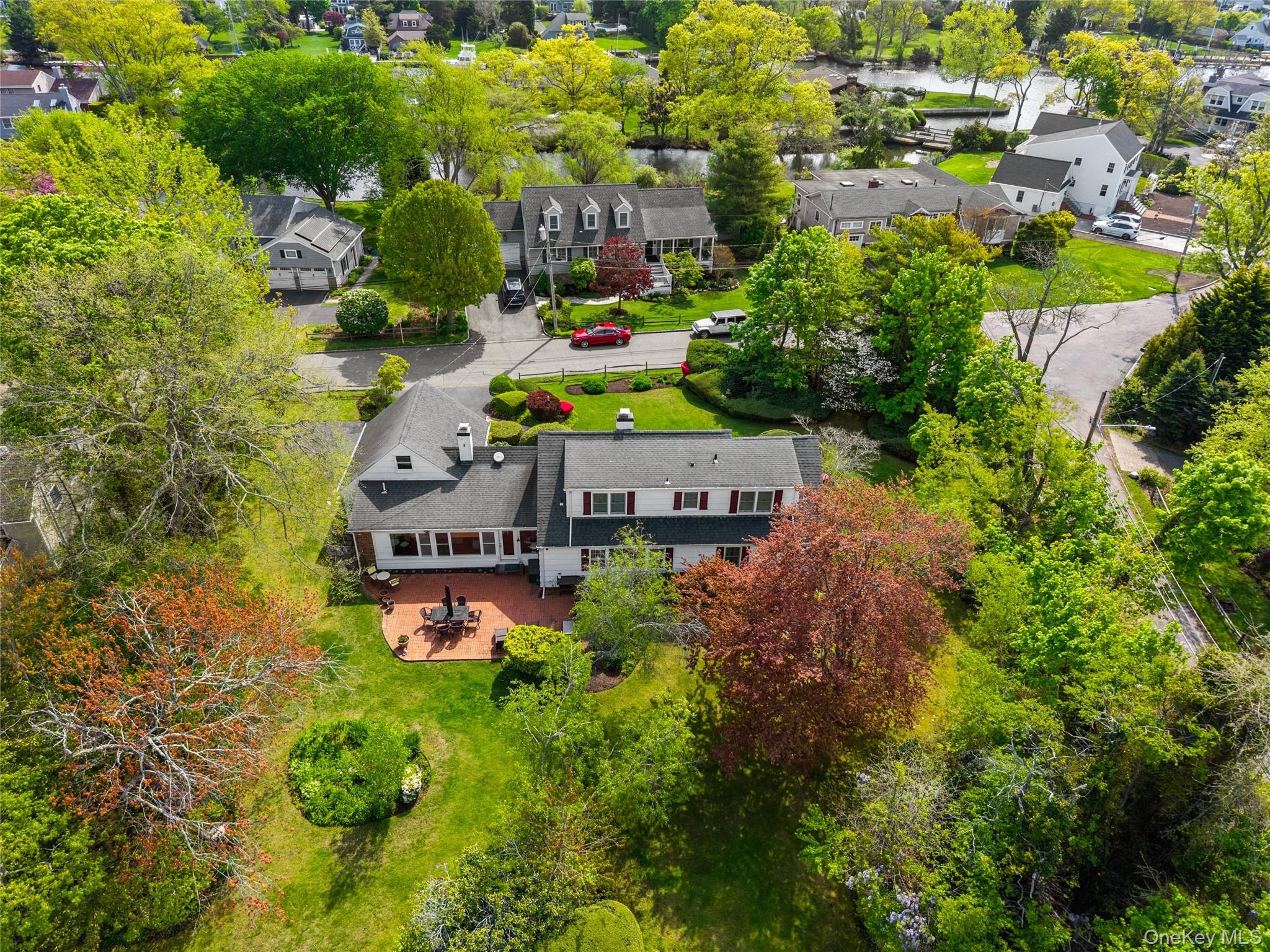 50 Belton Road Babylon, NY 11702 - Photo 29 of 34 This view shows street view, and rear yard and patio.