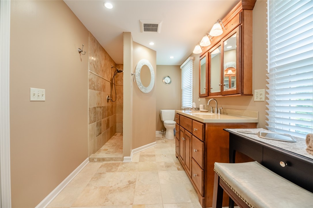 77 Misty Pine Road Perinton, NY 14450 - Photo 28 of 47 THE WALK-IN SHOWER IS CURVED (FOLLOW THE LINE OF T