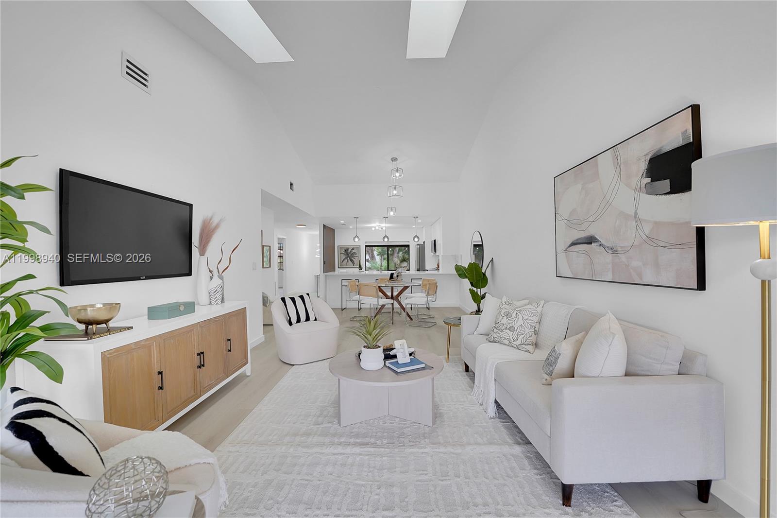 7736 La Mirada Drive Boca Raton, FL 33433 - Photo 23 of 56 a living room with furniture and a flat screen tv