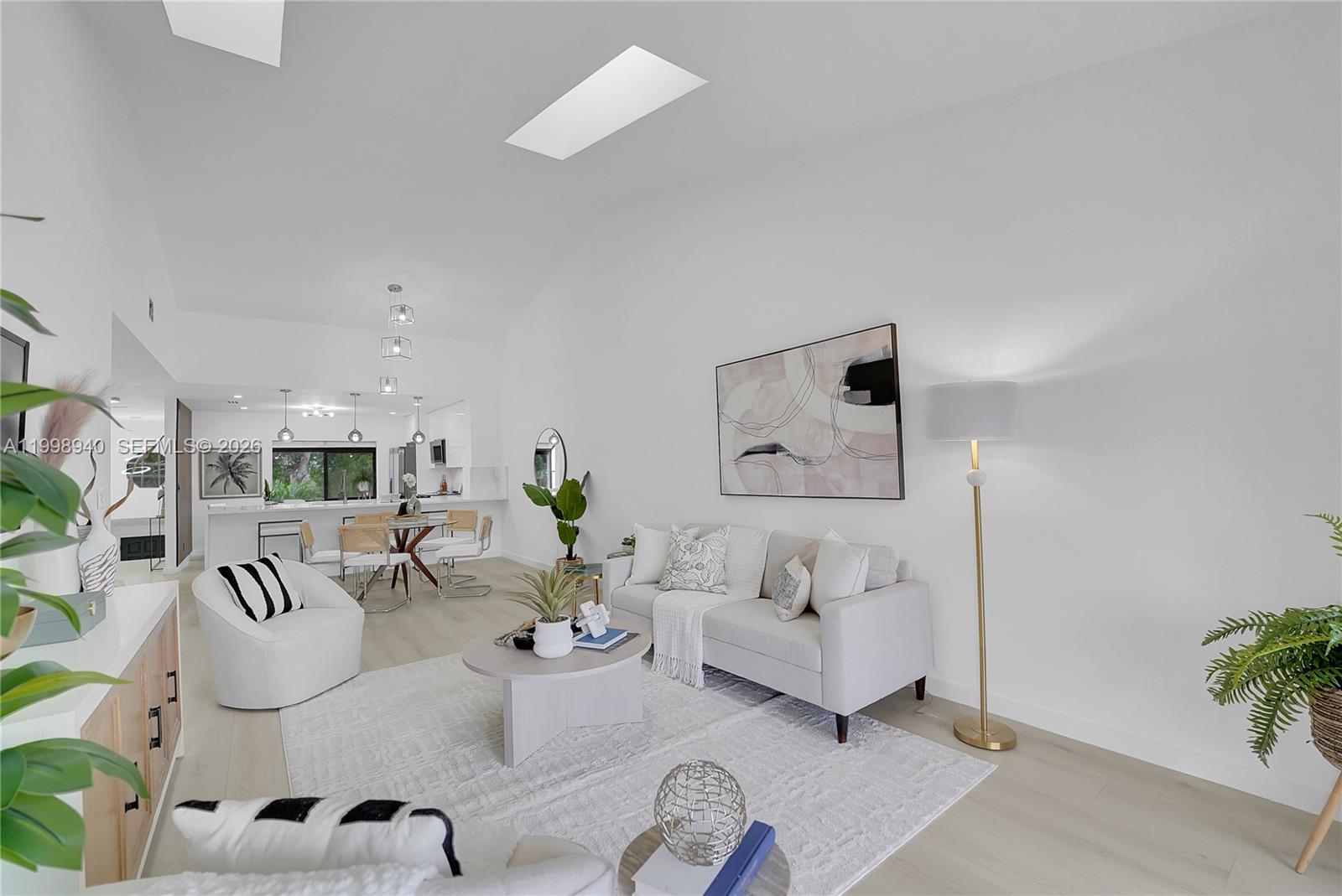 7736 La Mirada Drive Boca Raton, FL 33433 - Photo 26 of 56 a living room with furniture and white walls