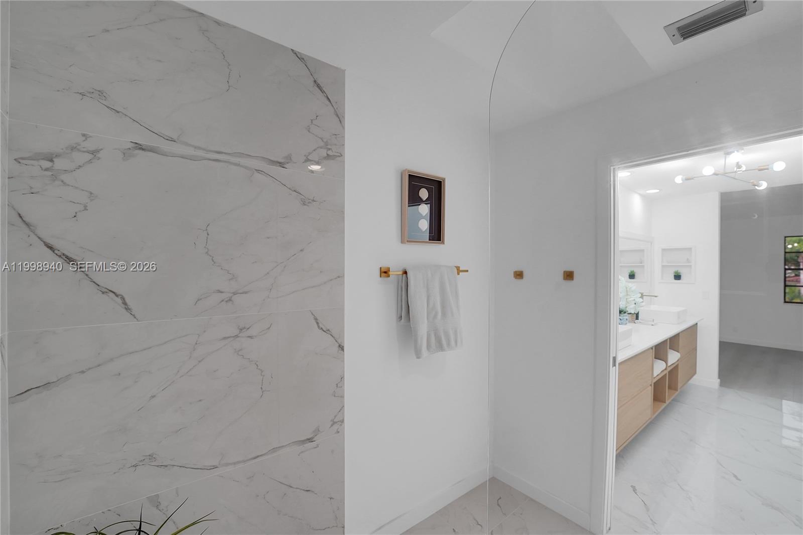 7736 La Mirada Drive Boca Raton, FL 33433 - Photo 32 of 56 a bathroom with a shower