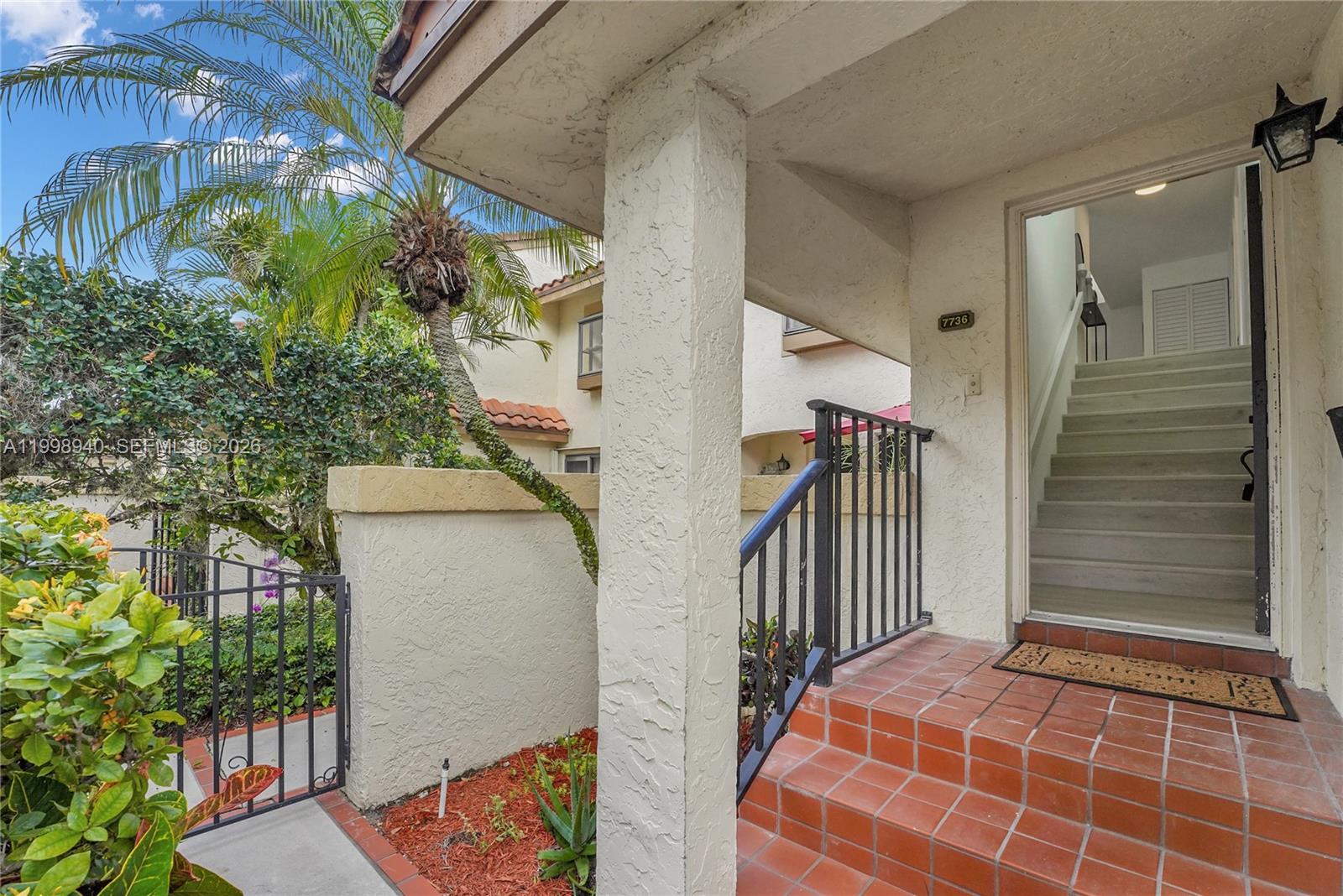 7736 La Mirada Drive Boca Raton, FL 33433 - Photo 43 of 56 a balcony view with a potted plant